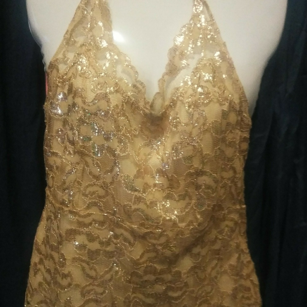 Shinny gold open back shirt